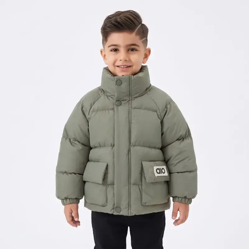 068b6995-9b61-47c3-8133-1d94d7a3864f کاپشن باکسی پفکی پسرانه رنگ عدسی - تصویر 1