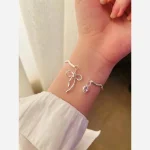 دستبند بنگل دخترانه طرح پاپیون پرنسسی استیل رنگ ثابت فریزایز - Image 4