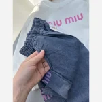 ست بلوز و شلوار لی دخترانه بچگانه طرح Miu Miu دورس لاکرا سایز 45 تا 70 - تصویر 7