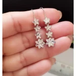 گوشواره نقره آویز عیار 925 طرح گل با روکش طلا سفید - تصویر 3