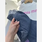 ست بلوز و شلوار لی دخترانه بچگانه طرح Miu Miu دورس لاکرا سایز 45 تا 70 - تصویر 5