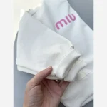 ست بلوز و شلوار لی دخترانه بچگانه طرح Miu Miu دورس لاکرا سایز 45 تا 70 - تصویر 9