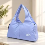 ساک ورزشی و استخری پارچه ای با 5 جیب بیرونی ابعاد 41 در 27 سانتیمتر