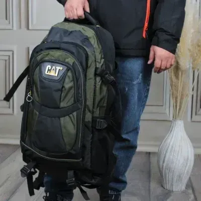bf00c884-f1f9-473d-8349-1194a0e06ef4 کوله پشتی پارچه ای چند جیب مناسب مدرسه دانشگاه مسافرت و ورزش - تصویر 1