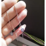 گوشواره نقره بخیه طرح چشم نظر عیار 925 با روکش طلا سفید - تصویر 3